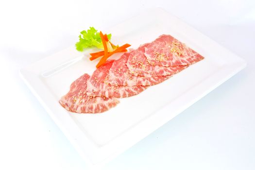 High grade sliced Hida wagyu beef isolated on white background