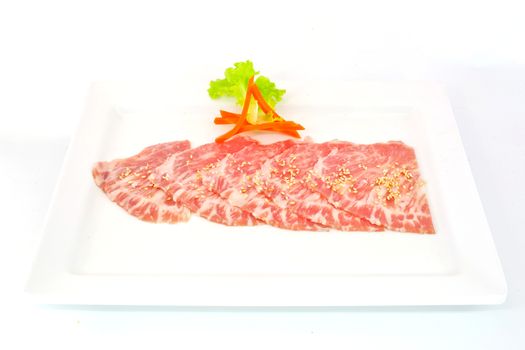 High grade sliced Hida wagyu beef isolated on white background