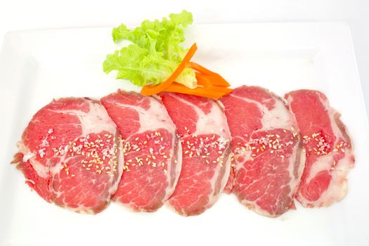 High grade sliced Hida wagyu beef isolated on white background