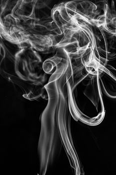 illuminated smoke that propagates on a black background