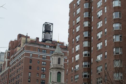 Water tower are iconic in NYC and their function is the distribution of potable water and providing emergency storage for fire protection