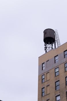 Water tower are iconic in NYC and their function is the distribution of potable water and providing emergency storage for fire protection