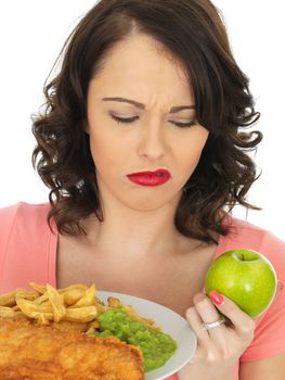 Young Attractive Woman Eating Fish and Chips with Mushy Peas