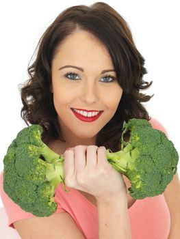 Young Attractive Woman Holding Raw Broccoli