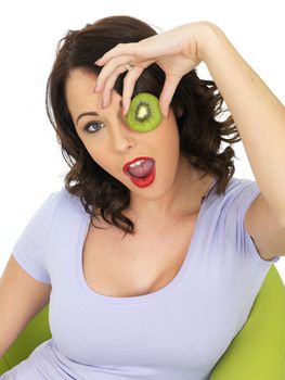 Young Healthy Woman Holding Fresh Ripe Kiwi Fruit