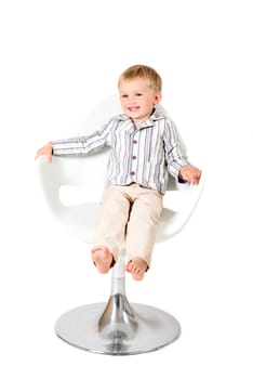 Boy in shirt shot in the studio on a white background