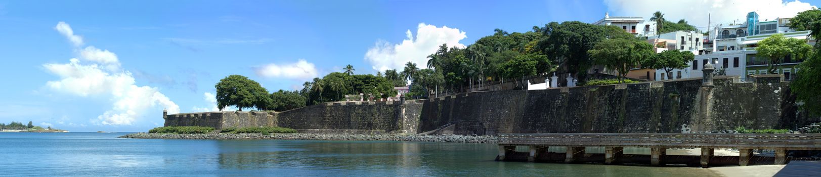The city boundary and old decaying wall of El Morro fort located in Old San Juan Puerto Rico.