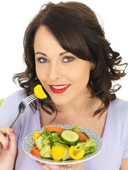 Young Attractive Woman Eating a Healthy Mixed Salad