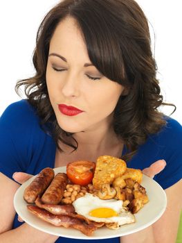 Young Attractive Woman Eating a Full English Breakfast