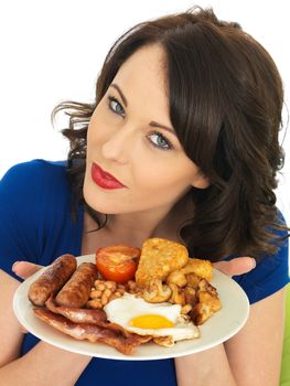 Young Attractive Woman Eating a Full English Breakfast