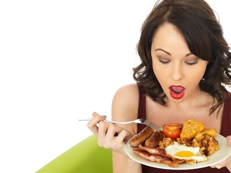 Young Attractive Woman Eating a Full English Breakfast