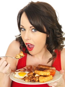 Young Attractive Woman Eating a Full English Breakfast