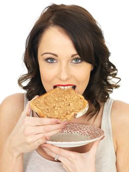 Young Healthy Woman Holding Toast with Crunchy Peanut Butter