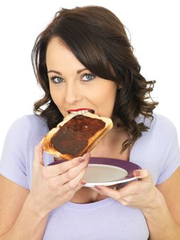 Healthy Young Woman Holding Toast Spread with Yeast Extract
