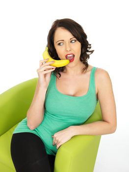 Healthy Young Woman Holding a Banana