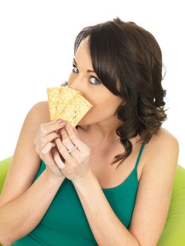 Young Healthy Woman Eating Crispy Thin Crackers