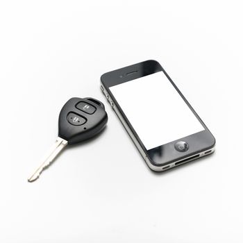 car key with smart phone isolated on white background