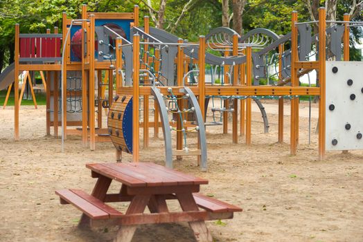 Empty playground swing close up photo outdoors