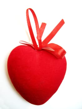 Red valentine heart isolated on the white background