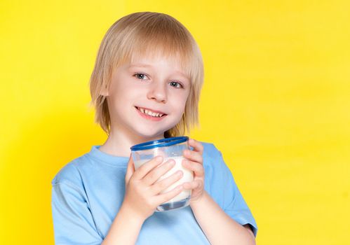 Little boy drinking milk