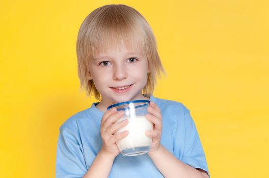 Little boy drinking milk