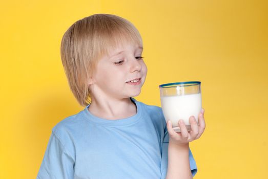 Little boy drinking milk