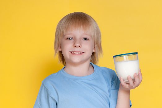 Little boy drinking milk