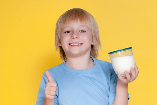 Little boy drinking milk