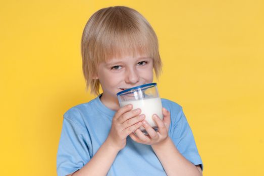 Little boy drinking milk