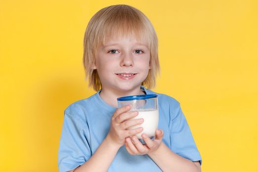 Little boy drinking milk