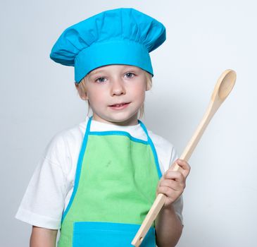 Child as a chef cook