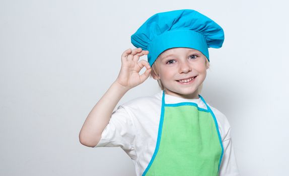 Child as a chef cook