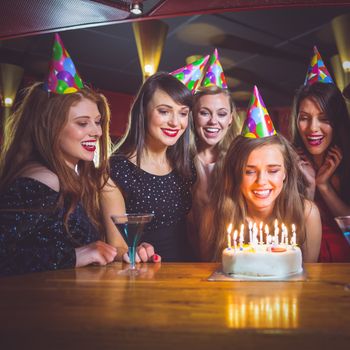 Friends celebrating a birthday together at the nightclub