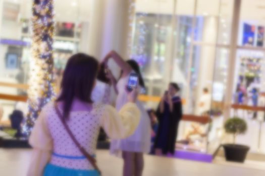 Blur focus ,Selfie teenagers taking pictures in the city