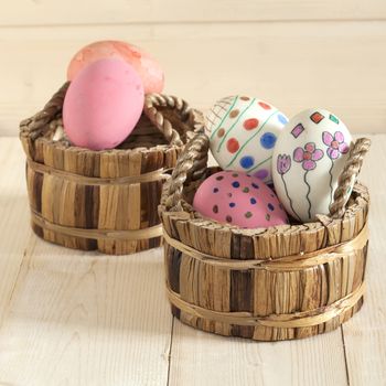 Easter eggs in the basket of wooden
