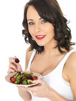 Attractive Young Healthy Woman Eating Mixed Salad