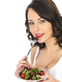 Attractive Young Healthy Woman Eating Mixed Salad