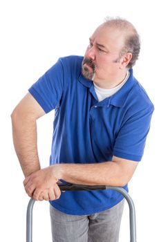 Serious Adult Man in Blue Shirt Leaning Against the Chair While Looking to the Left. Isolated on White.