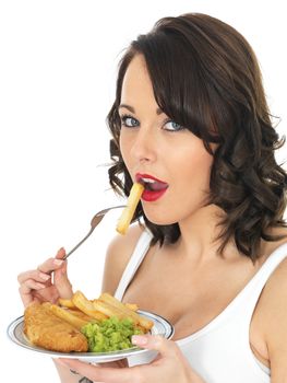Young Woman Eating Fish and Chips with Mushy Peas