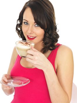 Attractive Young Woman Holding a Cup of Cappuccino