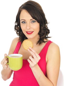 Attractive Young Woman With Tea and Biscuits