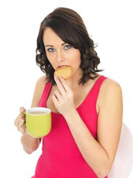 Young Woman With Tea and Biscuit