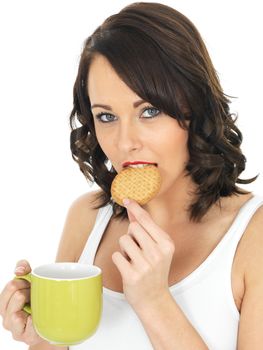 Young Woman With Tea and Biscuit