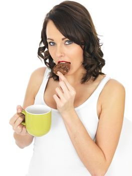 Young Woman With Tea and Biscuit