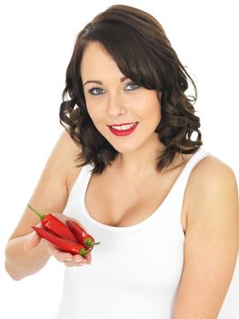 Happy Young Woman Holding Fresh Red Chillies
