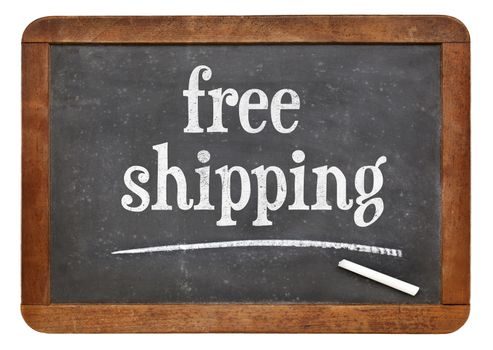 free shipping - marketing concept - text on a vintage slate blackboard