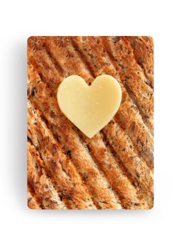 Heart shape slice of cheese on toasted whole grain bread over a white background