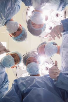 Medical students practicing surgery on model at the university