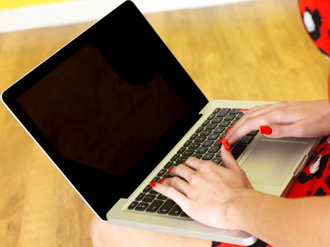 Woman Using a Laptop Computer