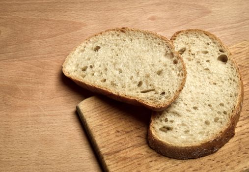 still life with sliced bread on a cutting board